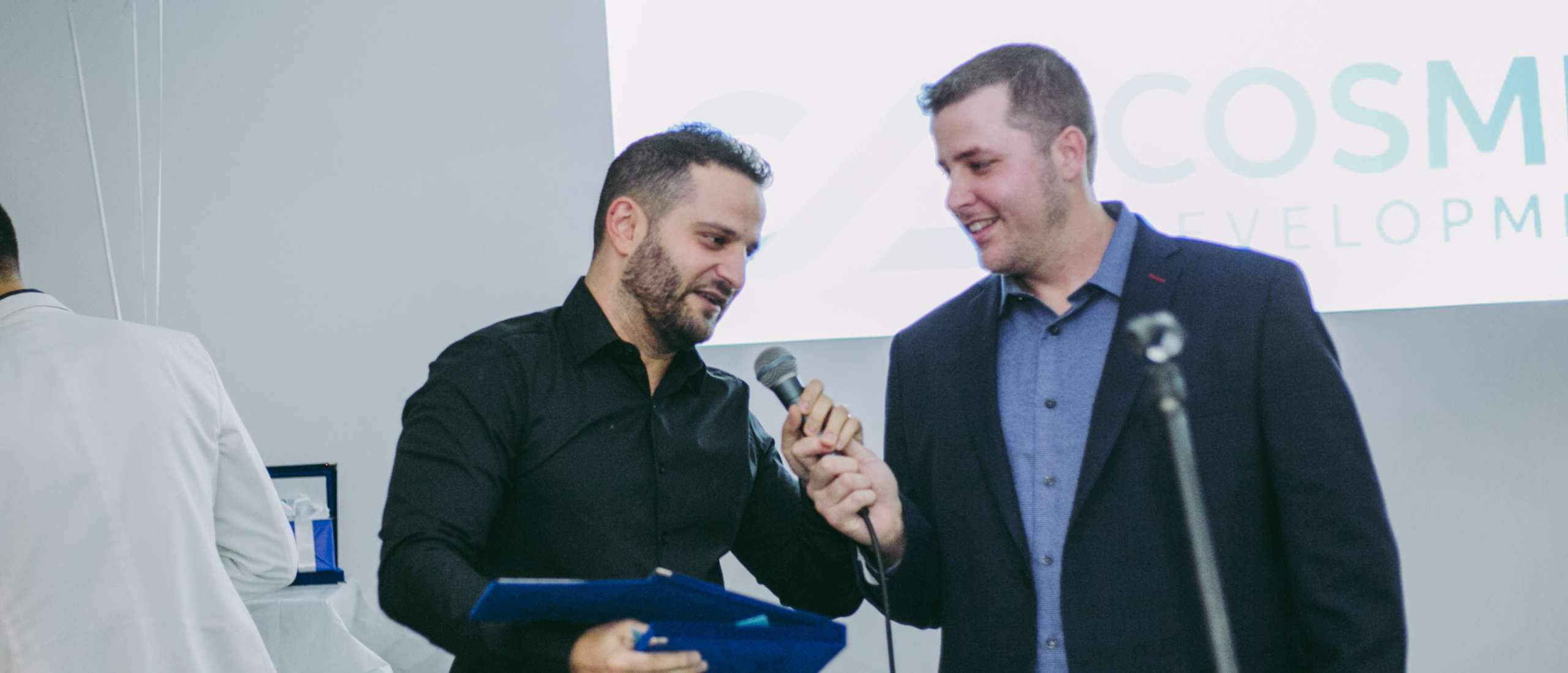 Rumble's Content Editor receiving an award